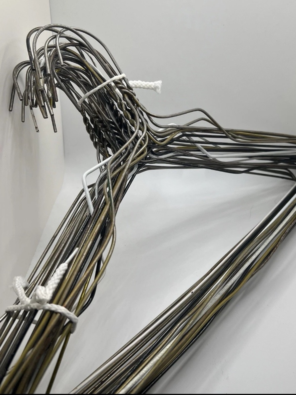 12 Wire Hangers in Random Colors Some Just Metal Some Coated for Clothing